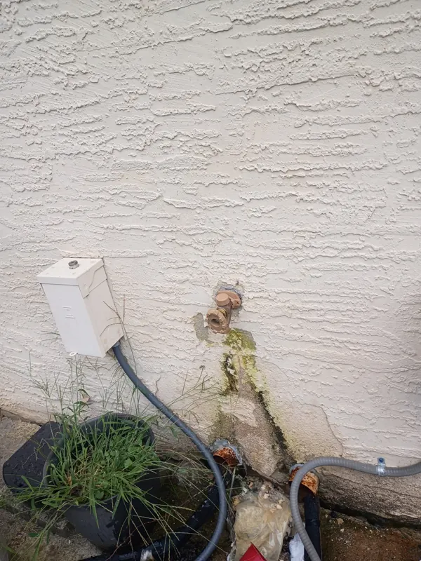 A new frost-free hose bib installed on the stucco wall